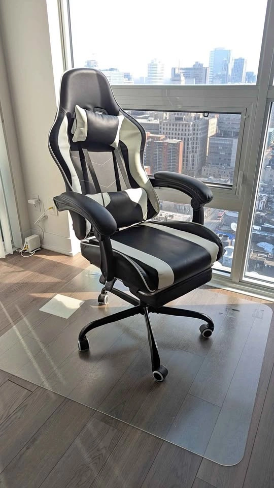 Gaming chair with footrest and massage