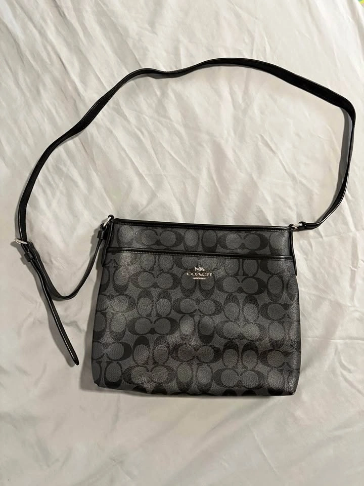 Signature C cross body