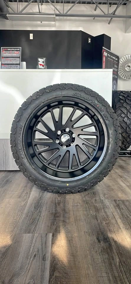 MOTO METAL 22x12 WHEELS FOR RAM 1500 W/ VENOM SWAMPTHING TIRES