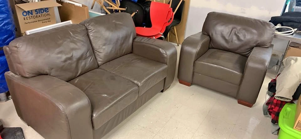 Leather love seat, chair, and coffee table