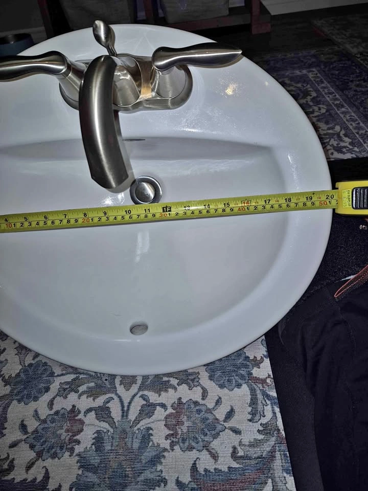 American Standard Sink and Moen Faucet