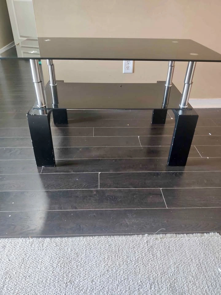 Used good condition glass top table for living room