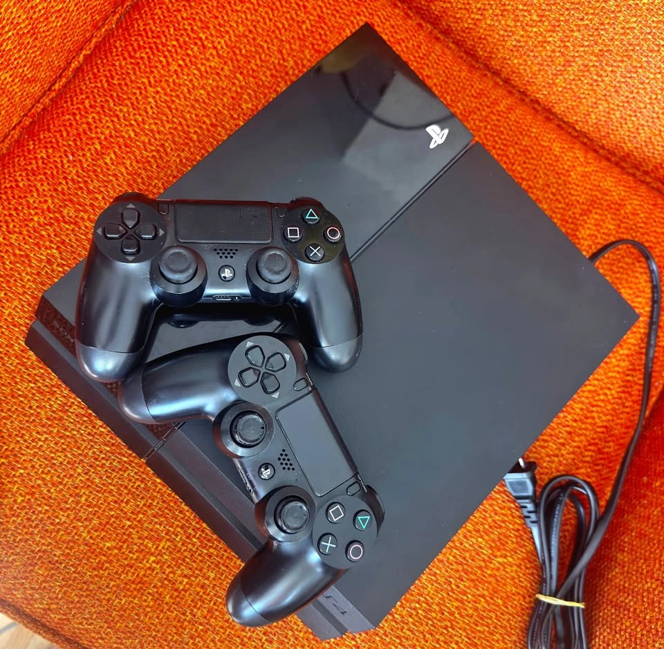 PS4 and two controllers