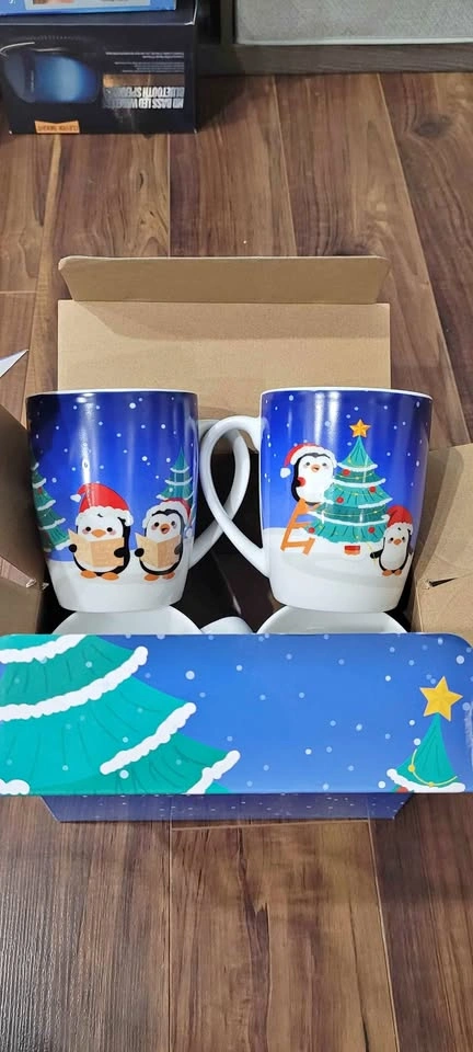 Brand new Set of 4 Christmas penguin porcelain mugs