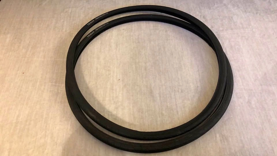 A Pair of Bike Tires. TRIBAN PROTECT 700x28