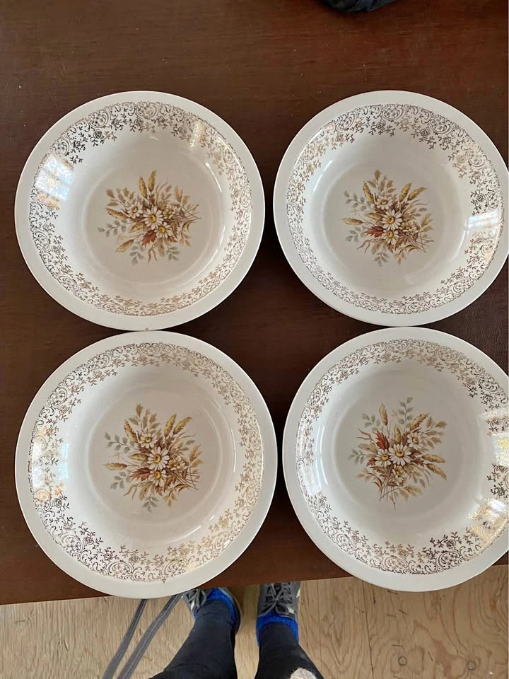 Four gold plated bowls, made in Canada.