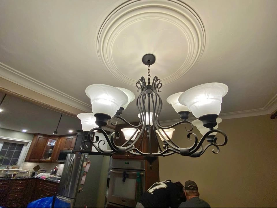 Wrought iron chandelier with 9 lights and covers