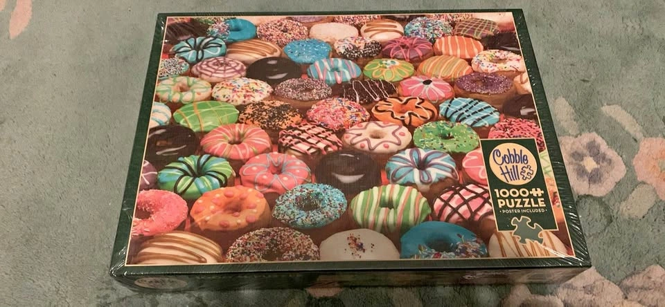 New in wrapped package 1000 piece puzzle - Cobble Hill