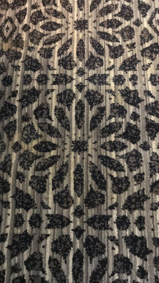 Textured area rug with bold woven pattern in deep navy and soft - photo 2