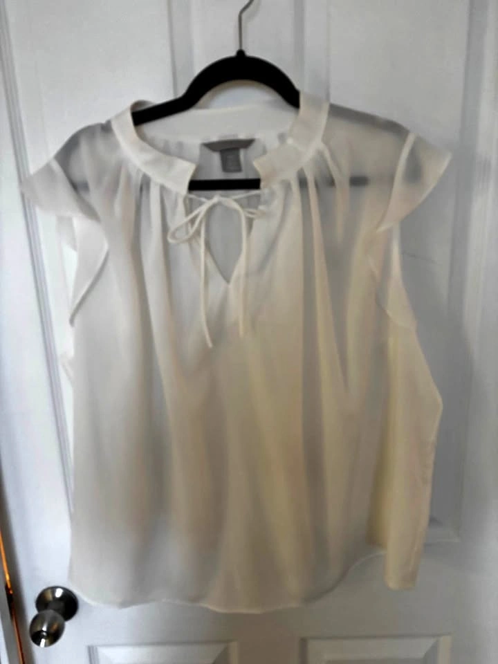 White flutter sleeve blouse