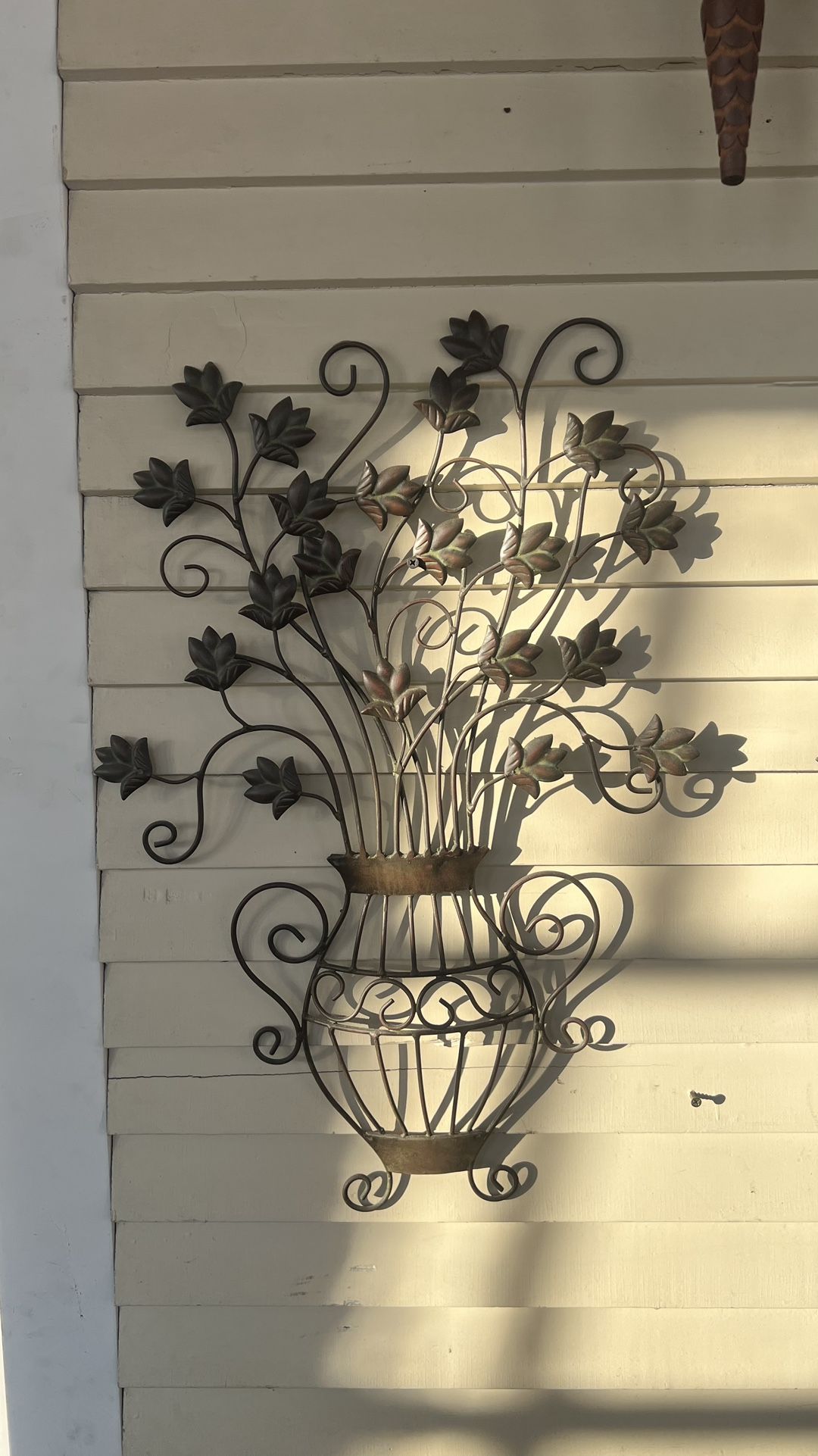 Two metal ornaments