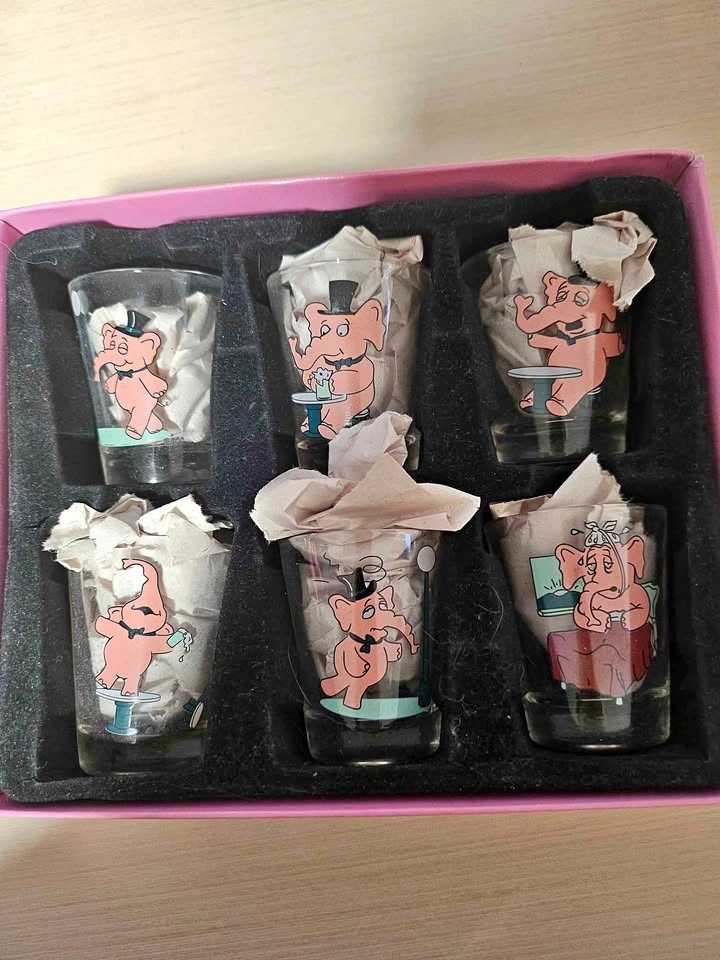 BNIB Pink elephant shot glasses.