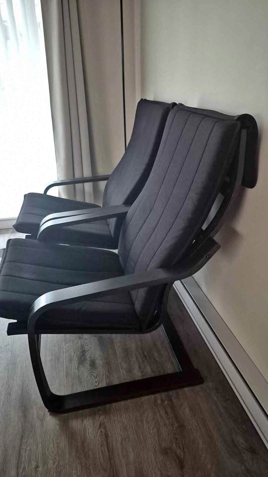 2 Black IKEA armchairs