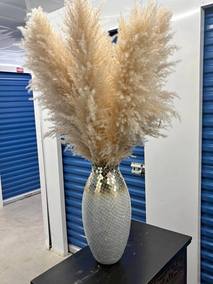 Floor vase with grass stems