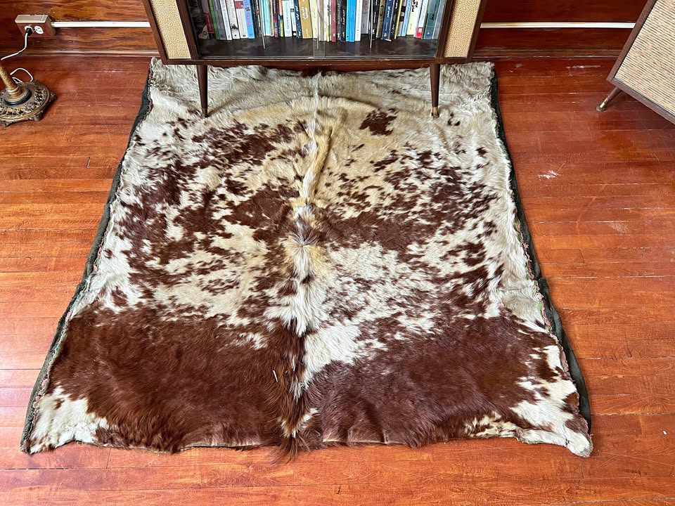 Vintage cow rug