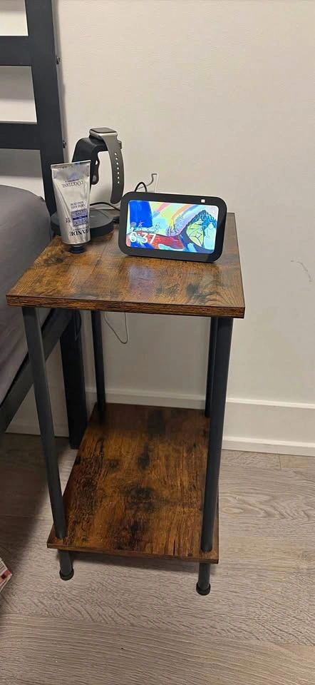 Rustic 2-tier side table with outlet for charging.
