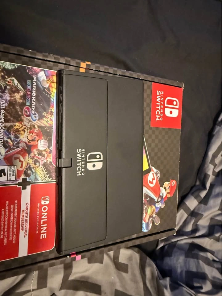 Nintendo Switch OLED + NBA 2K25 + 128GB SD + Mario Kart - photo 2
