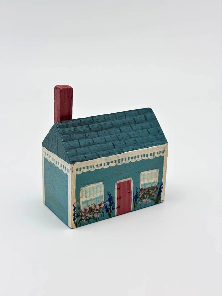 Small wooden hand painted house