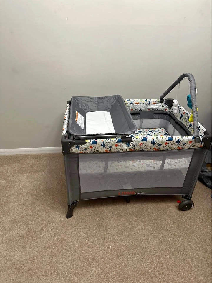 LIVINGbasics Portable Baby Playpen/Playard with Changing Pad