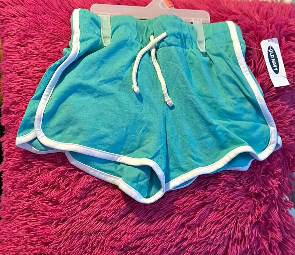 GIRLS SHORTS SIZES: SMALL & LARGE PRICE: $7 AGES: 6-7