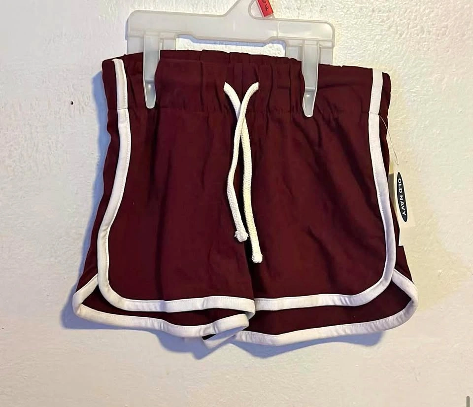 GIRLS SHORTS SIZE:SMALL AGES:6-7 PRICE:$7