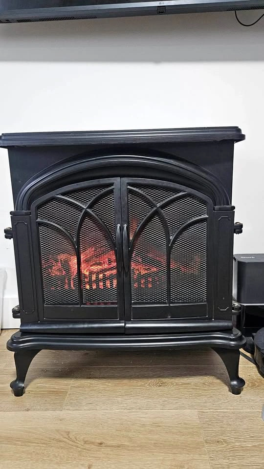 Free standing electric fireplace with double doors