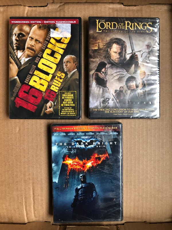 Unopened Action Movie DVDs, $5 each
