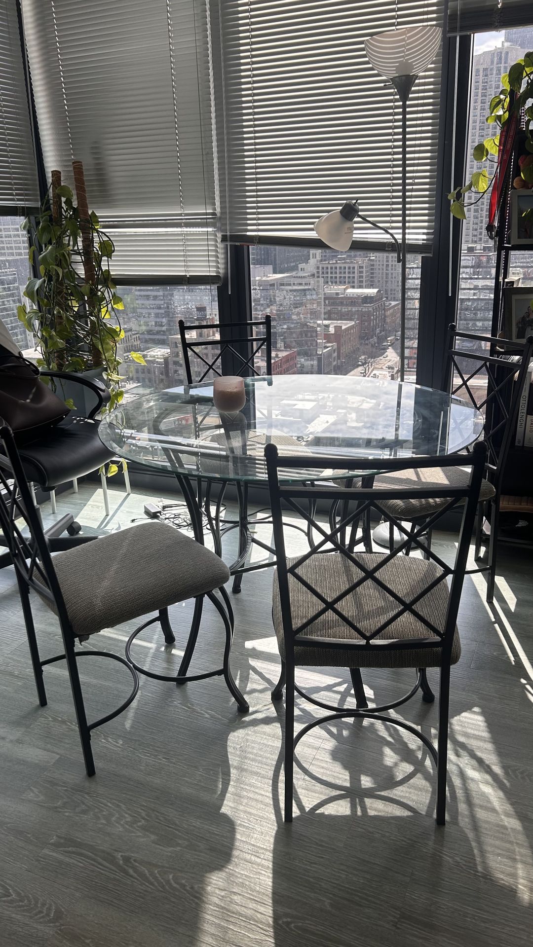 Glass and metal round top dining table