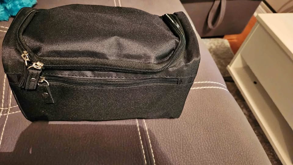 Brand new travel toiletries bag in black