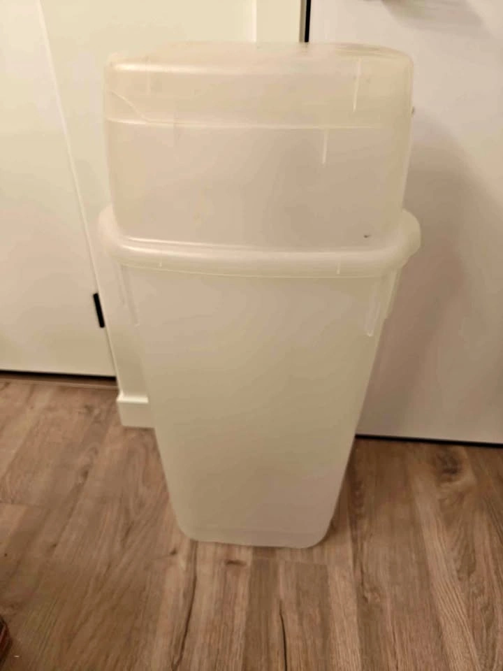 2 Rubbermaid Storage Bins with Lids