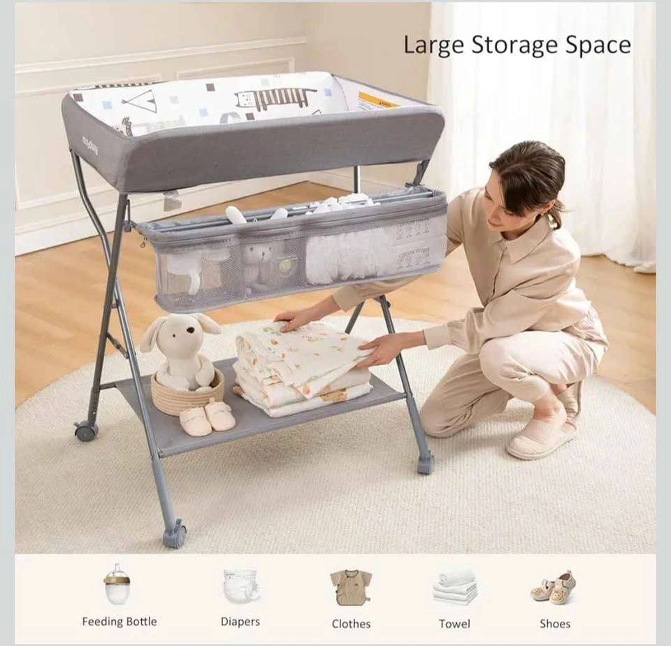 Baby Changing Table with Wheels and Storage + Free Diapers - photo 5