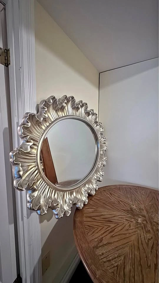 Silver ornate oval mirror