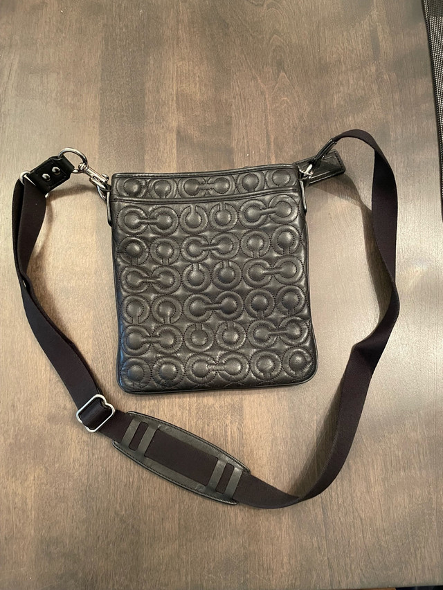 Coach black leather mini bag with adjustable canvas strap