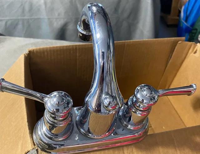 Moen chrome faucet bathroom vanity image indicator(2)