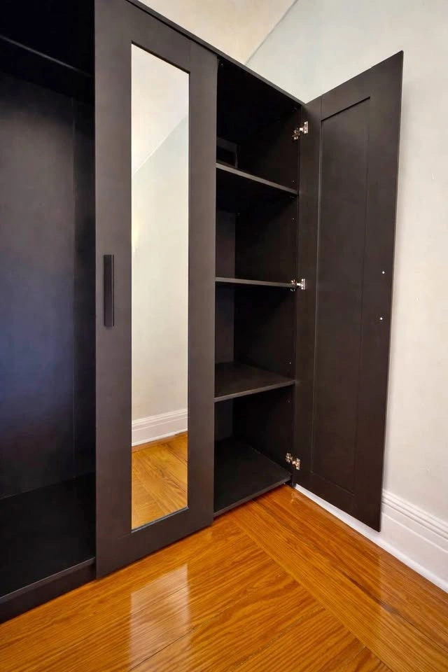 IKEA Black Wardrobe with Mirror – Excellent Condition