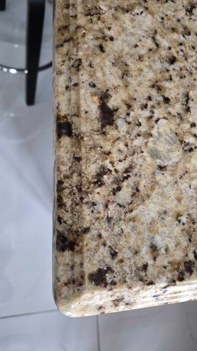 Kitchen Island with Granite Top and Dark Wood Cabinetry - photo 2