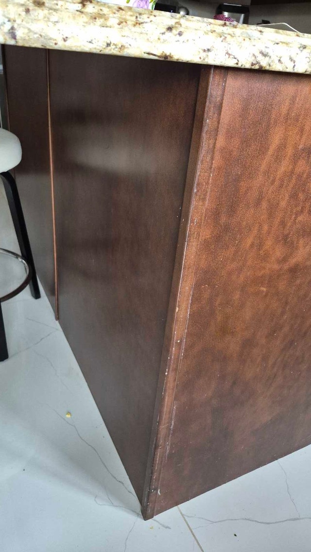 Kitchen Island with Granite Top and Dark Wood Cabinetry - photo 3