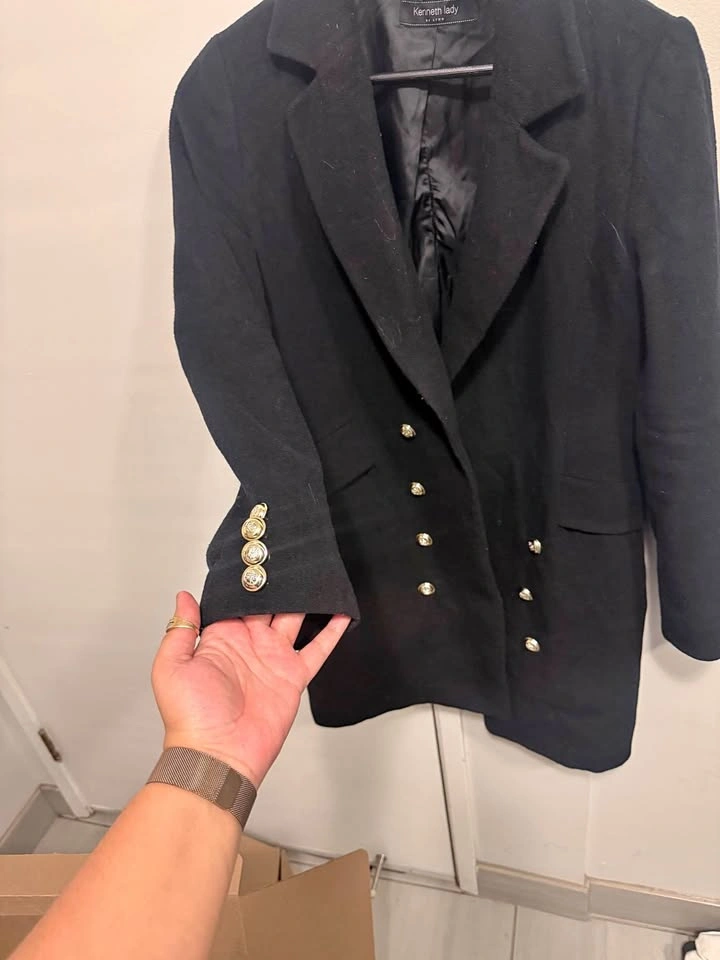 Black coat with gold buttons