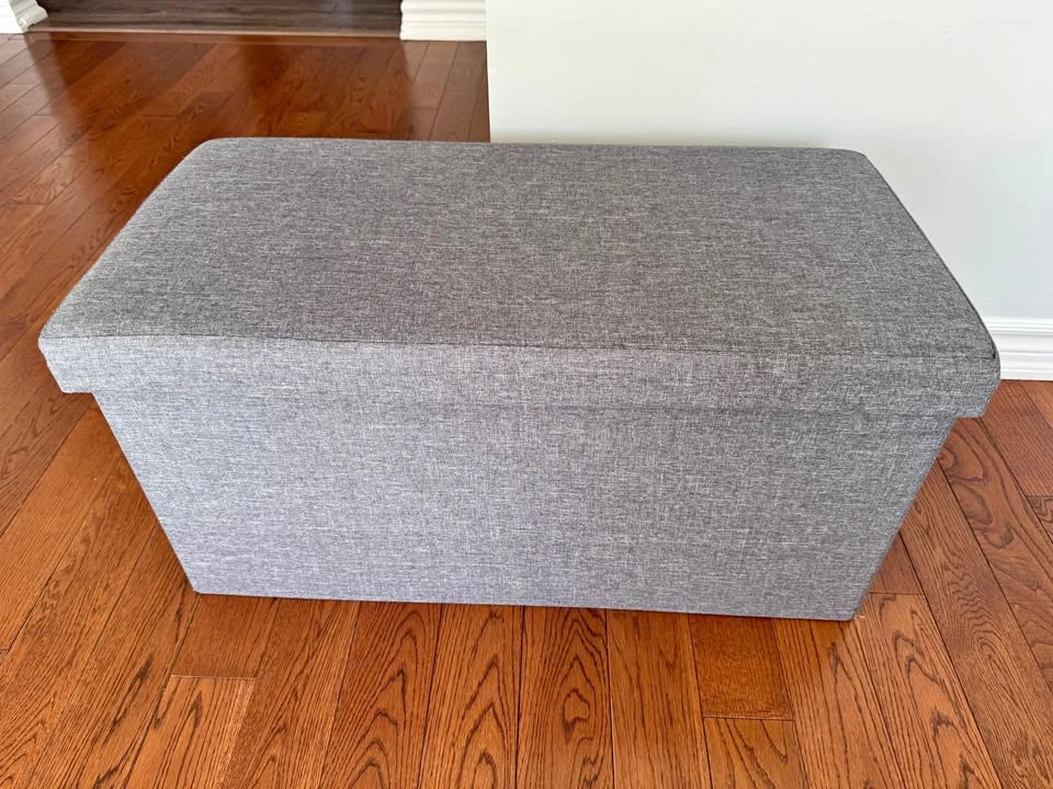 Grey ottoman with storage
