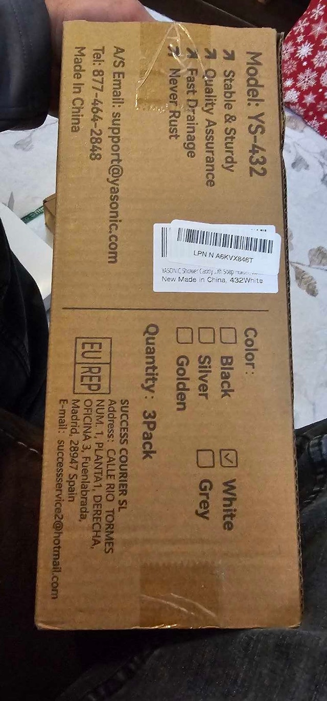 New in box shower caddy
