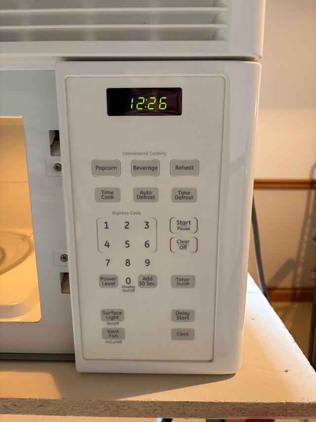 GE Over-the-Range Microwave - White - photo 2