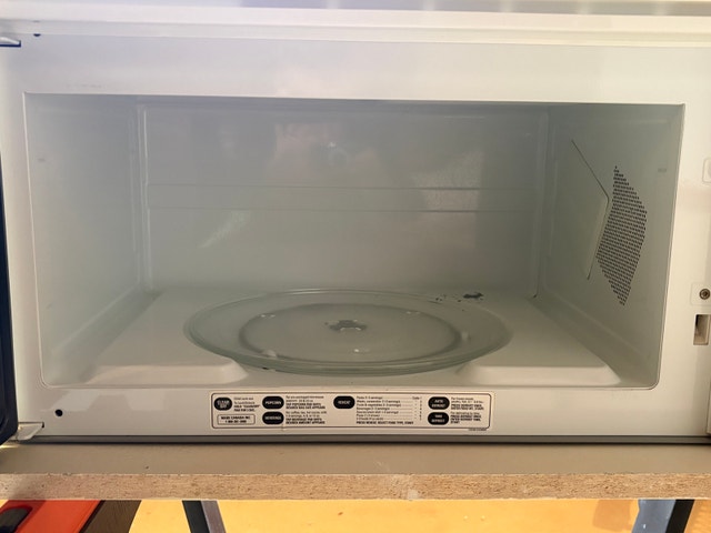 GE Over-the-Range Microwave - White - photo 3