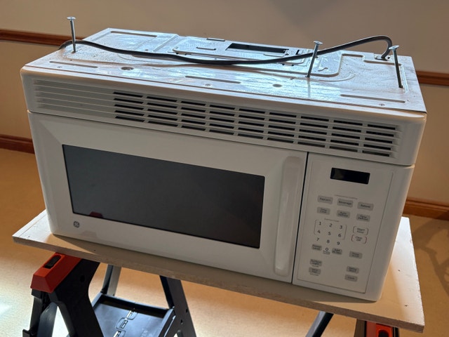 GE Over-the-Range Microwave - White - photo 4