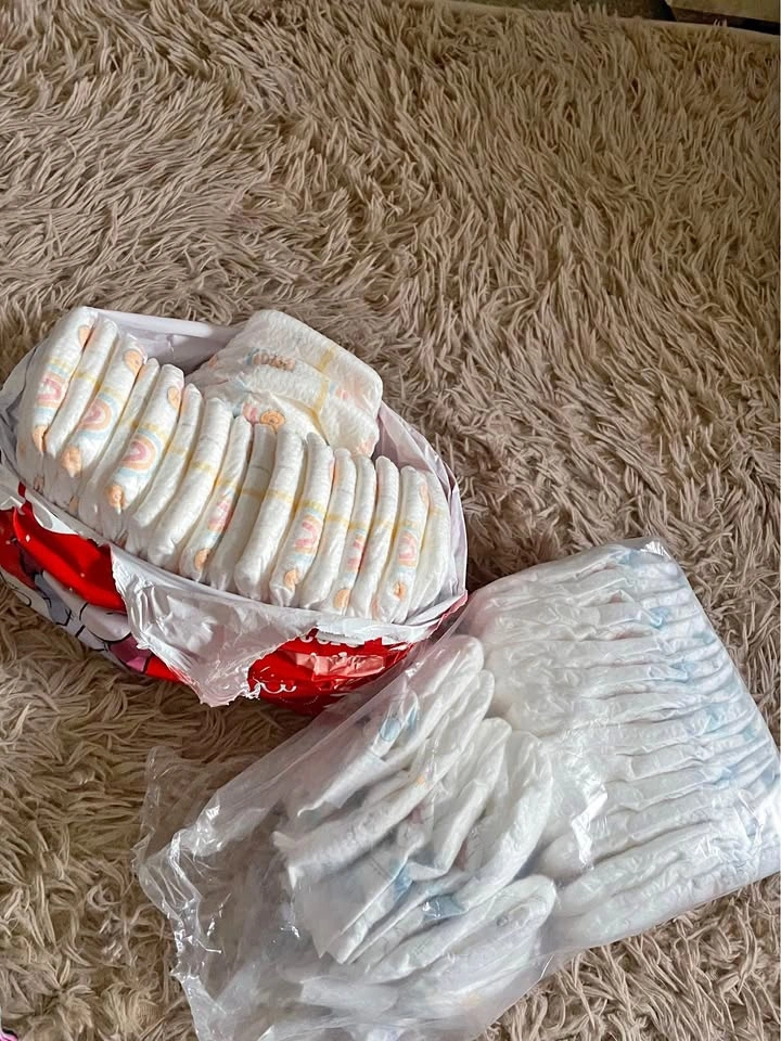 Size 1 & Size 2 Diapers - 35 Total