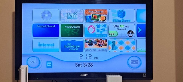 Patched Nintendo Wii Bundle + Accessories