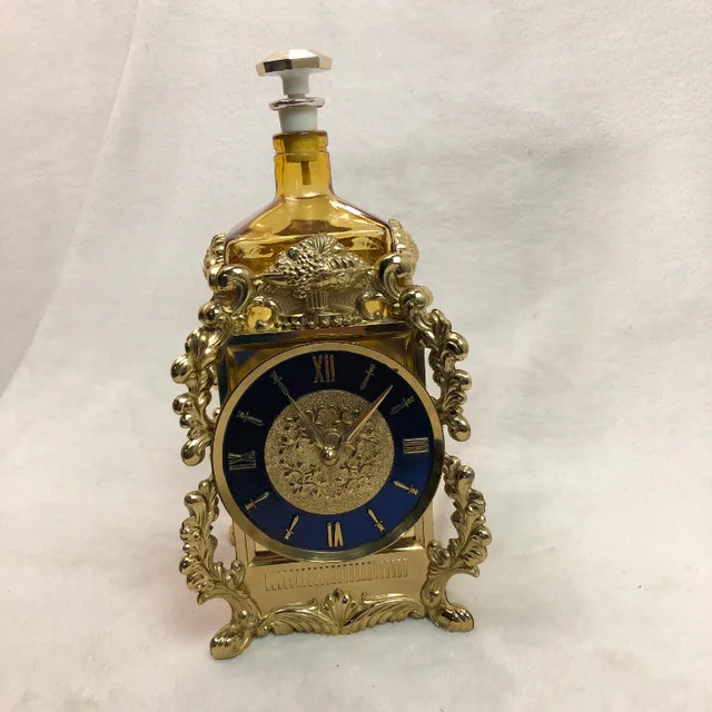 Vintage Perfume Bottle w/ Gilt Clockwork Brass Music Box Stand image indicator(2)