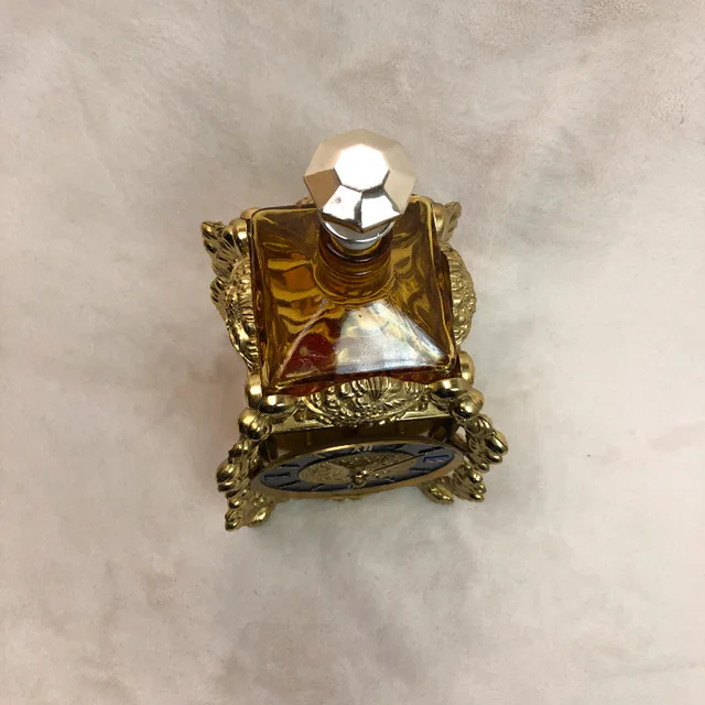 Vintage Perfume Bottle w/ Gilt Clockwork Brass Music Box Stand image indicator(4)