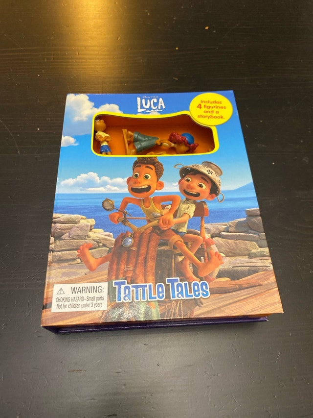 Used Luca story book with figurines