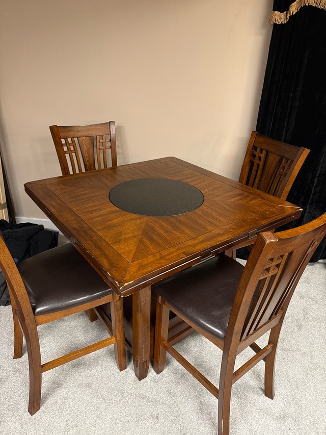 High top dining set with lazy susan centre