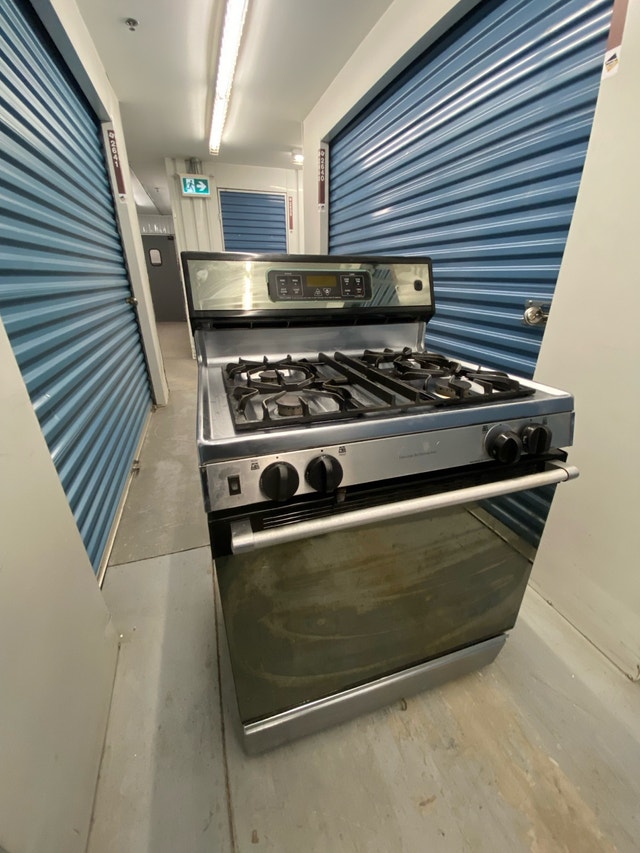 GE 30" Stainless Steel Gas Stove - 4 Burner - photo 3